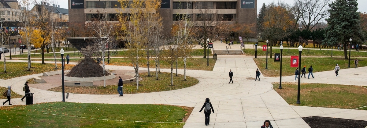 People walking in different directions in MLK Commons.
